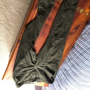 Army green skinny khakis.